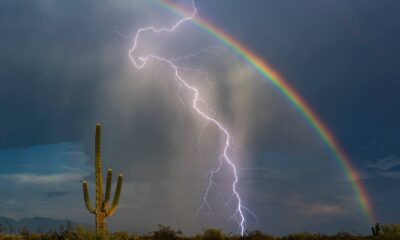 Lightnings and Rainbows: Lightning strikes and a rainbow forms during Minnesota storm